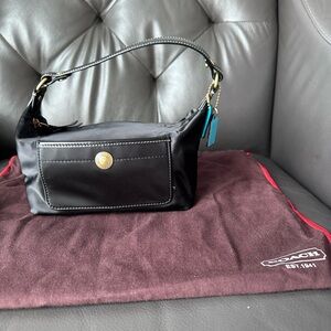 Black satin Coach purse